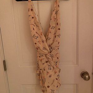 Backless baby pink patterned romper